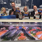 Pacific Seafood staff showing off the firm's new products in partnership with Kinder's