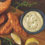 Fried whitefish on a cutting board