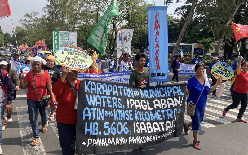 Philippine fishers protesting the encroachment of commercial vessels into waters traditionally designated for small craft