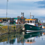 A fishing boat tied up in Ballyvaughan, Ireland