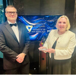 Ace Aquatec CFO Alan McLeod and CSMO Tara McGregor-Woodhams receiving the award