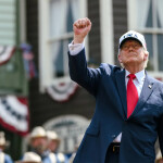 U.S. President Donald Trump with a raised fist