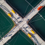 An aerial shot of a Chilean aquaculture net pen