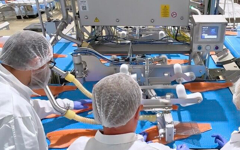 A salmon processing line at First Seafood