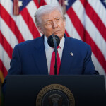 U.S. President Donald Trump standing at a podium