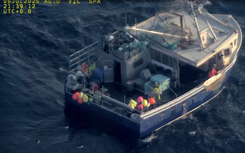 An aerial view of a fishing boat at sea