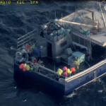 An aerial view of a fishing boat at sea