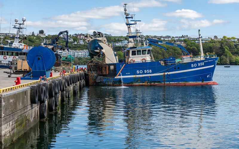 A fishing vessel docked in Kinsale, Ireland