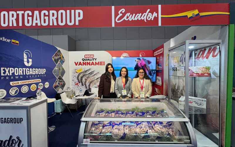 Sales team members from ExportGaGroup on the floor at Seafood Expo Global in Barcelona, Spain