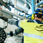 A worker for BioMar in a production facility