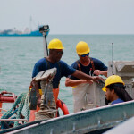 Workers with Ocean Harvesters on board a fishing vessel