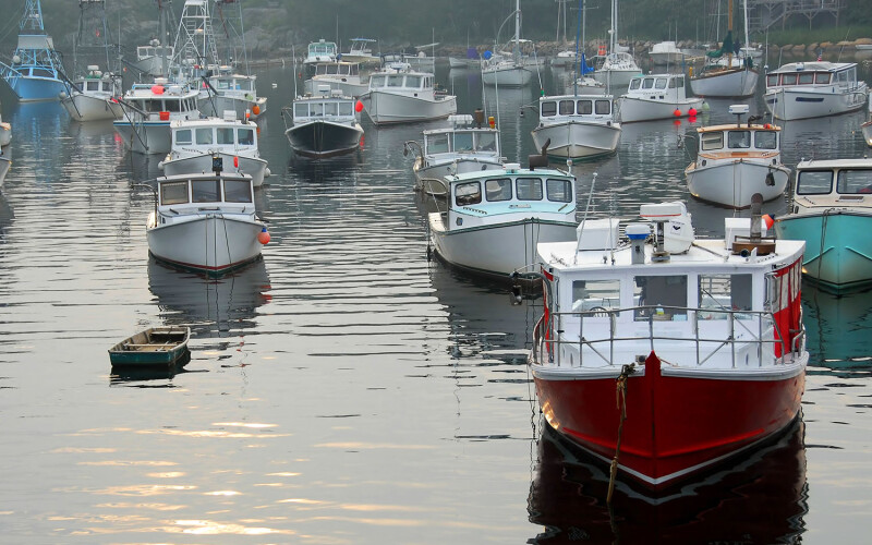 A fleet of Maine lobster boats in Perkins Cove, Maine