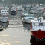 A fleet of Maine lobster boats in Perkins Cove, Maine