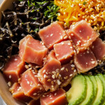 A bowl of Poke featuring tuna