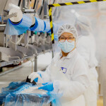 A worker inside a Sanford Limited processing facility