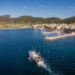 A fishing vessel returning to port in Spain