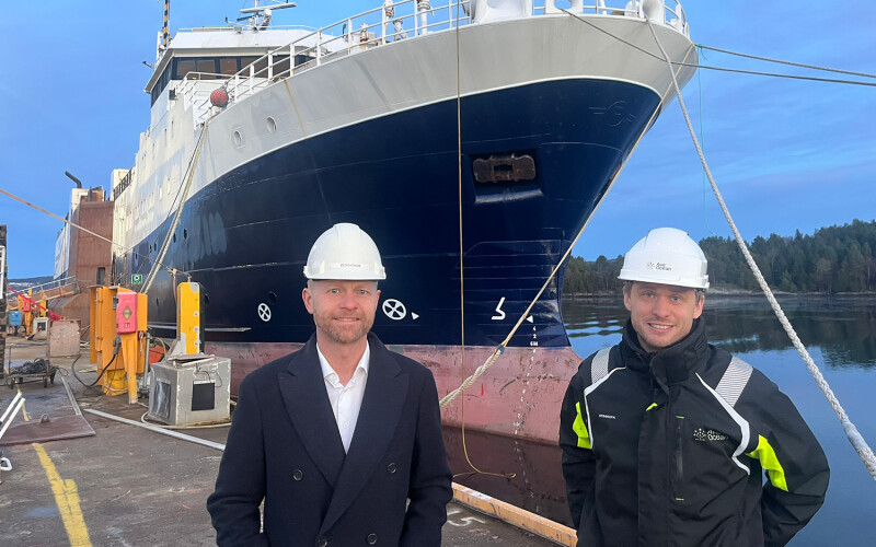 Ava Ocean Group CEO Øystein Tvedt and Board Chair Stian Tennfjord in front of the new vessel, Ava Pearl, which will recommence the company's non-invasive scallop fishing in the Barents Sea within the next few months