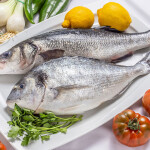 A photo of a sea bass and sea bream