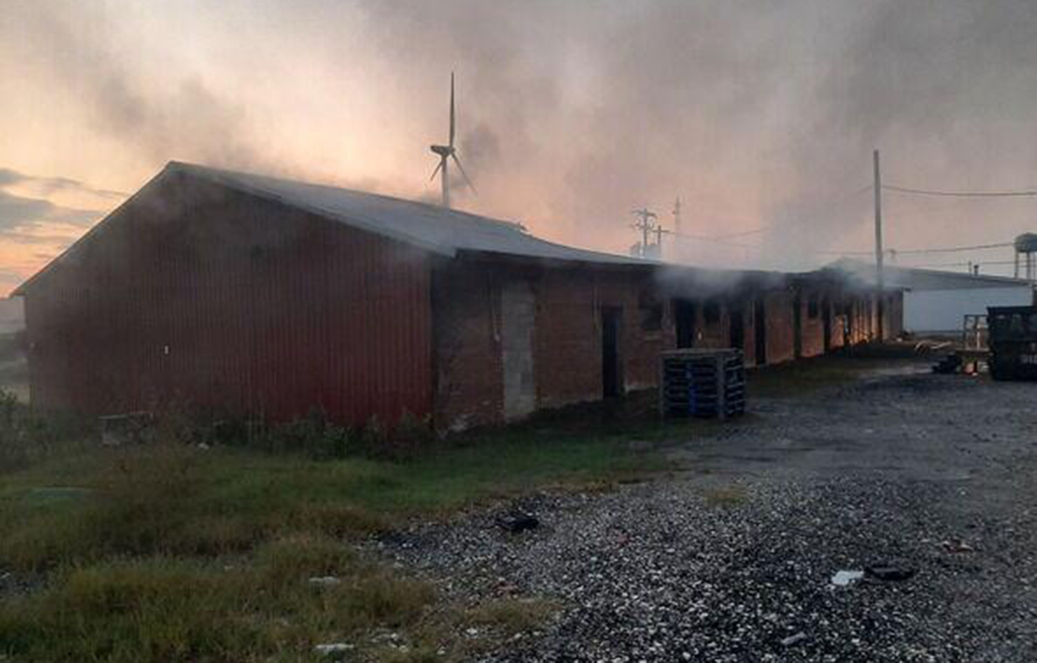 Handy Seafood’s crab shedding plant in Crisfield, Maryland, U.S.A., with smoke coming out of the building
