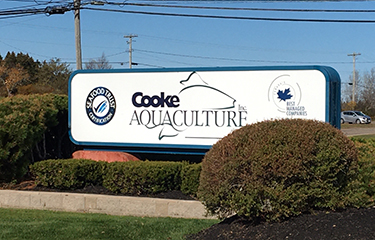 The sign outside of Cooke Aquaculture's headquarters in Canada