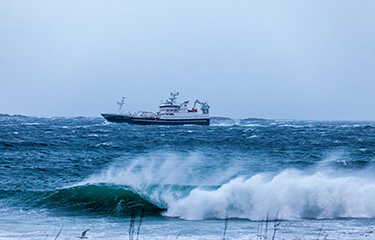 Fishing vessel Heroyhav sailing in bad weather.