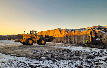 Construction vehicles and workers at work at Gigante Salmon's land-based salmon facility.