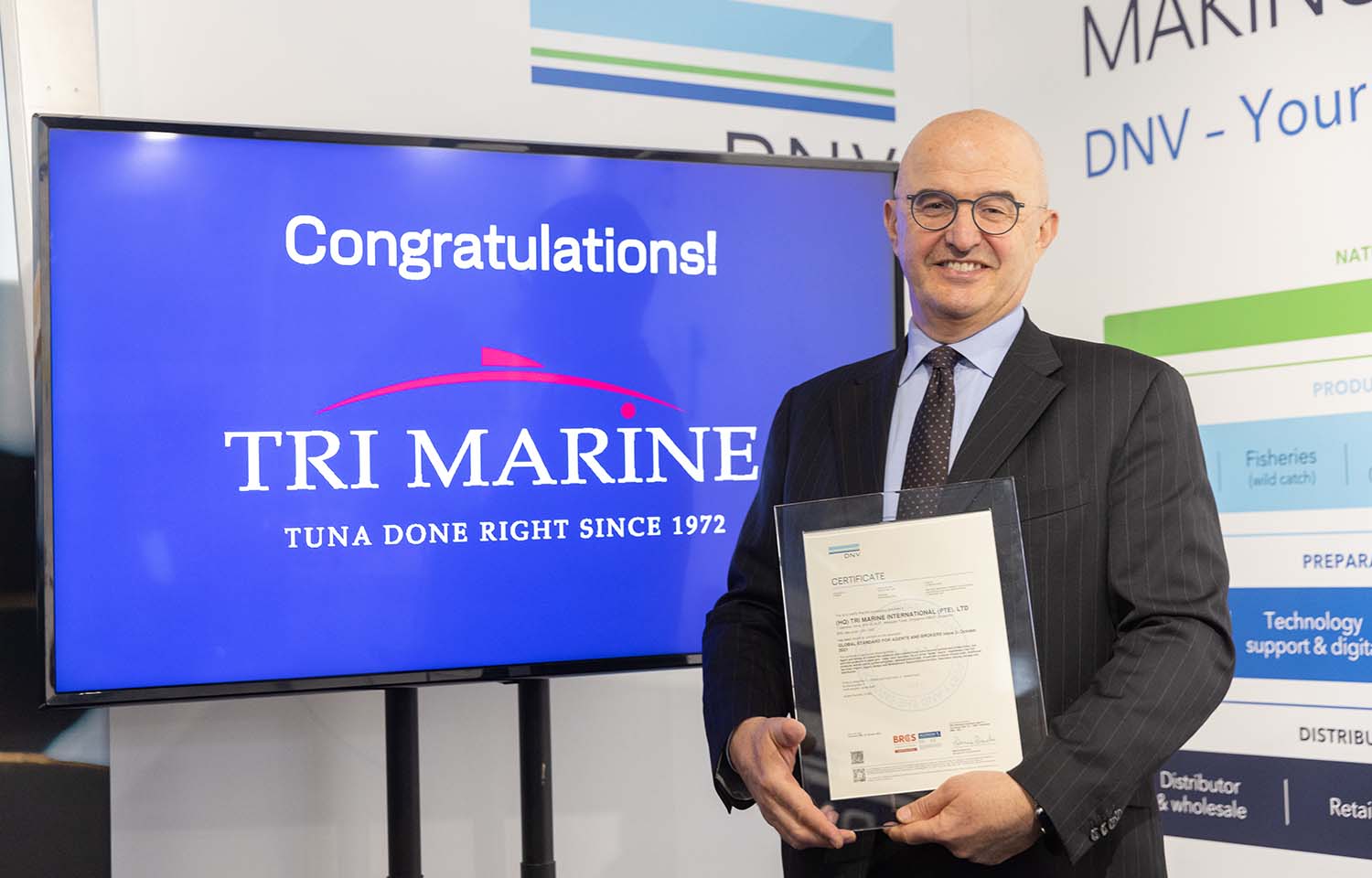 Bolton Food Global Sustainable Development Director receiving the BRCGS Agents and Brokers certificate for Tri Marine Group at the 2024 Seafood Expo Global
