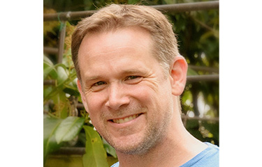 A headshot of Peter Battisti.