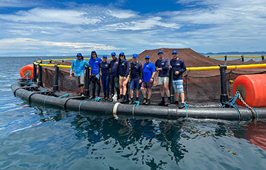Members of the Coalition for Sustainable Aquaculture at a fish farm in Central America.