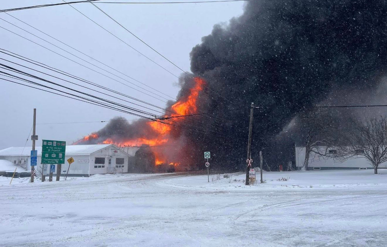 An early photo of the fire at the Aquashell processing facility