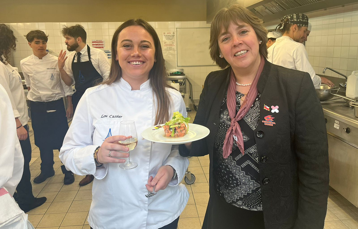 Chilean Salmon Council Executive President Loreto Seguel (right) met with aspiring French chefs to discuss getting more coho salmon onto their menus