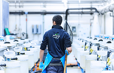 A BioMar employee in one of the company's facilities.