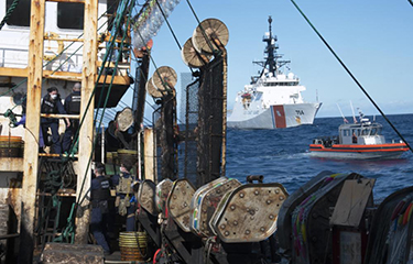Chinese fishing vessels involved in standoff with US Coast Guard on the  high seas