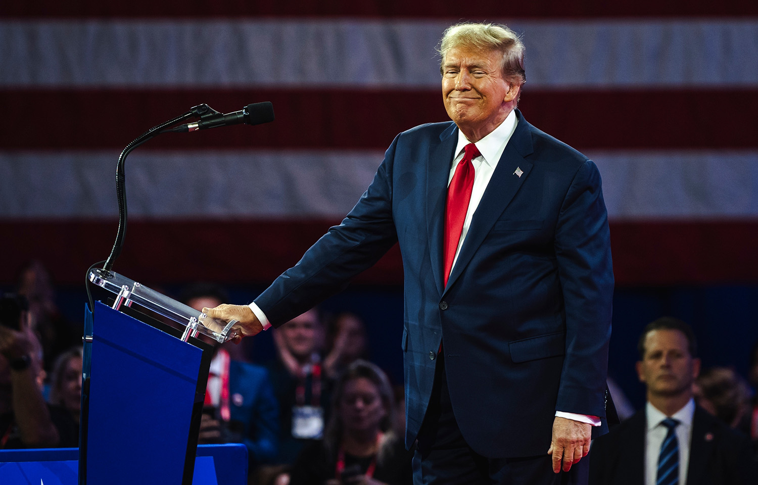 Donald Trump stands at a podium in Maryland.