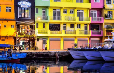 A Taiwan harbor with colorful buildings.