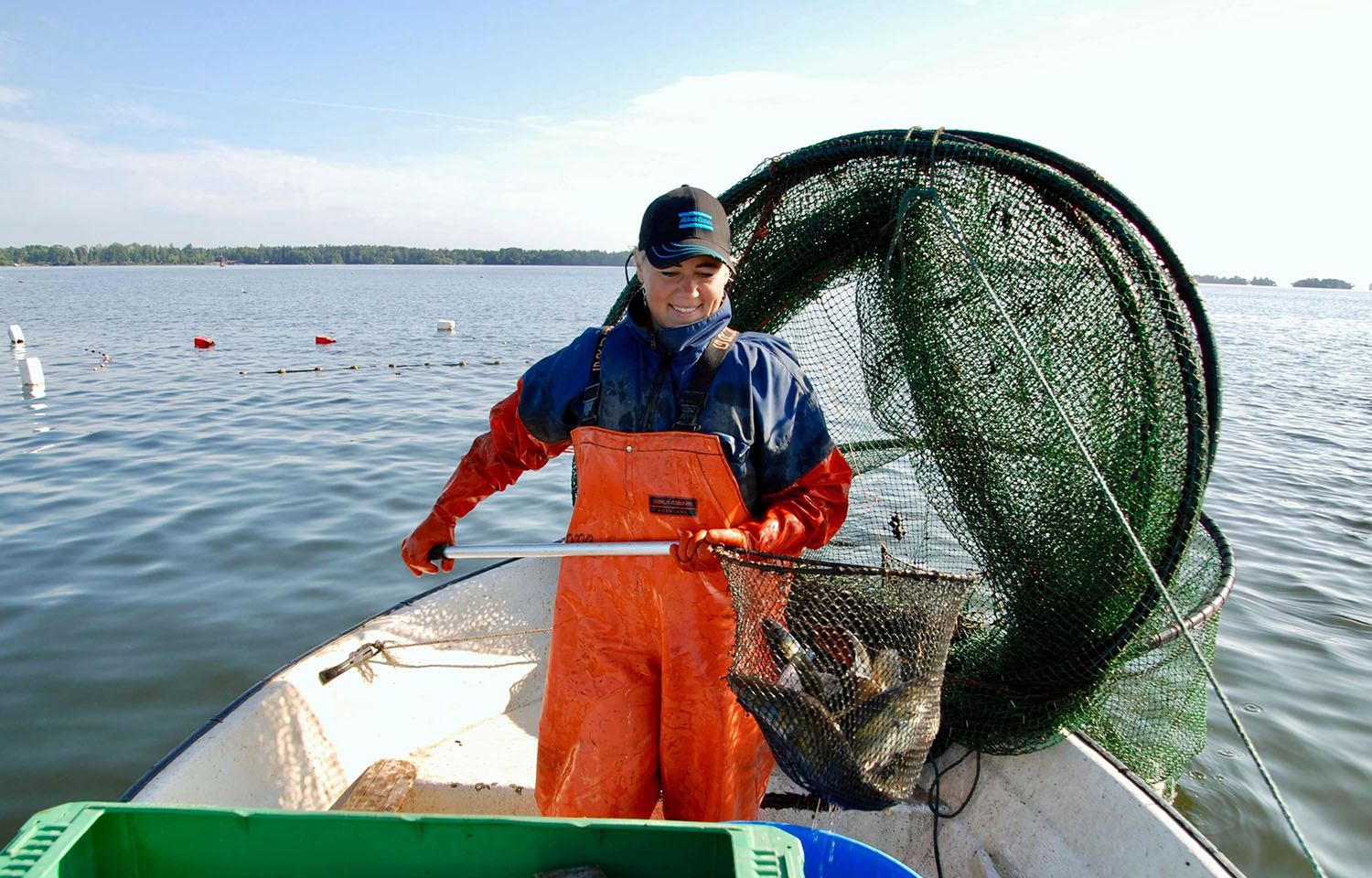 Woman fishing for pikeperch on Lake Hjalmaren