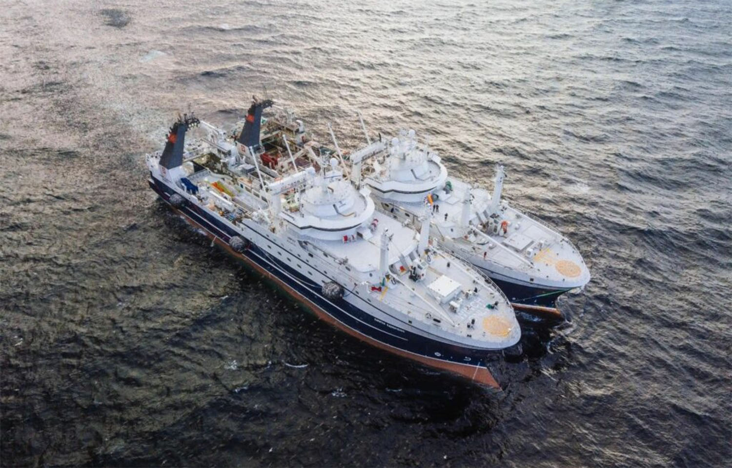 A pair of Russian Fishery Company vessels at sea