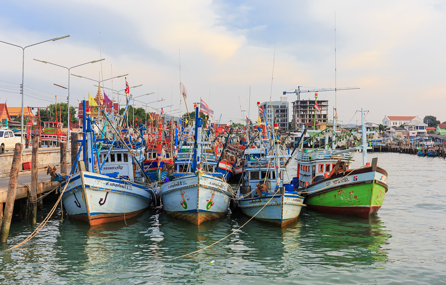 Thai fishing boats tied up at the dock