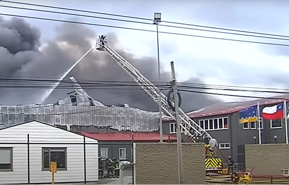 A photo of the Entrevientos salmon processing on fire.