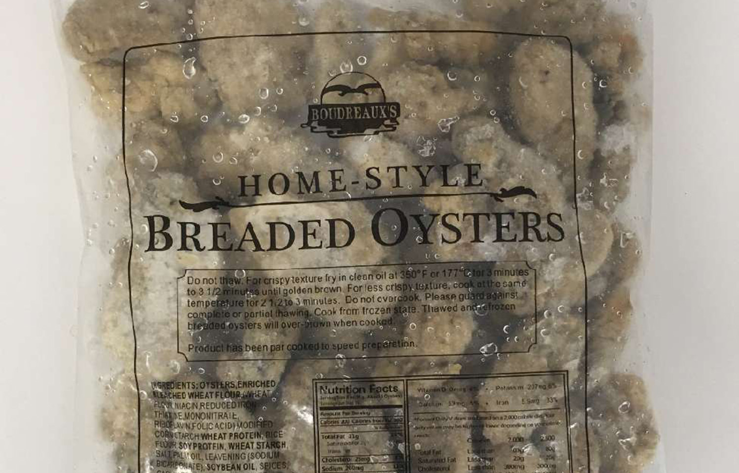 A package of frozen breaded oysters with the Boudreaux brand on it