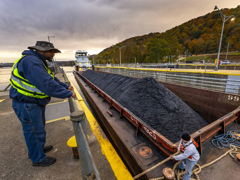 A towboat pushes a coal barge Monaca, Pa.